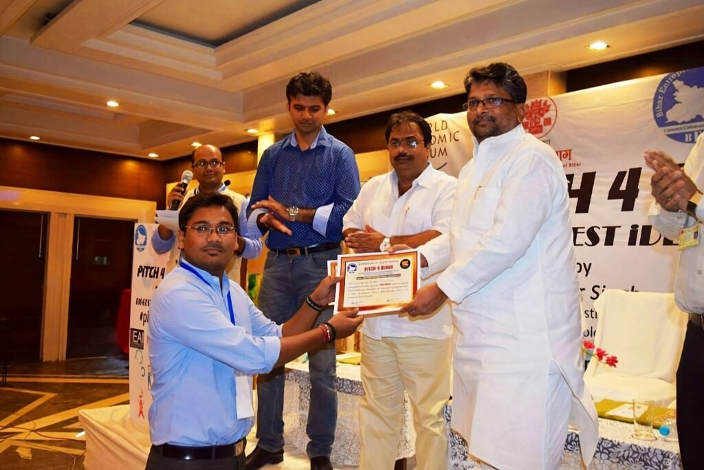 Dheeraj Kumar receiving Award
