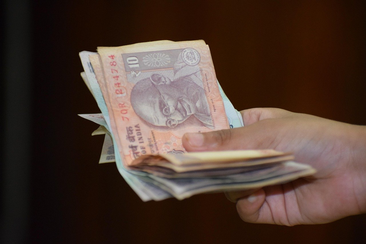 The Indian rupee fell by 9 paise, marking an overall decline of 90.58 against the dollar in early trade